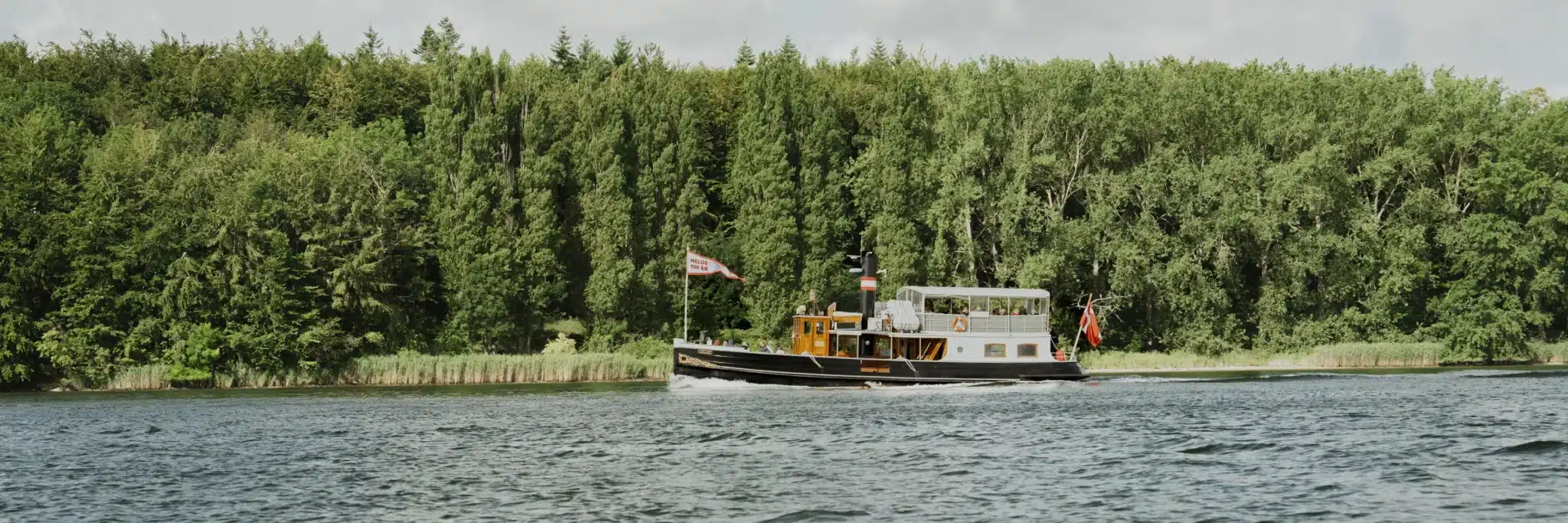 Passengers on the deck of M/S Helge